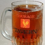 A pint of Courage Tavern