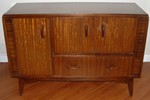  look. The sideboard,right, is also Brandon finished in mid-oak
