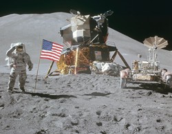 Apollo 17: James Irwin beside the Lunar Module and Lunar Rover