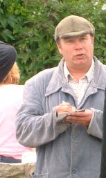 David Lonsdale who plays David Stockwell signs an autograph for fans