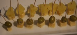 Cheese and olives and cheese and pineapple on sticks Cheese and olives and cheese and pineapple on sticks