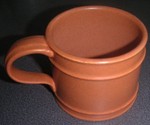 Portmeirion Meridian cup in terracotta (1971) (Image pottyforpots)
