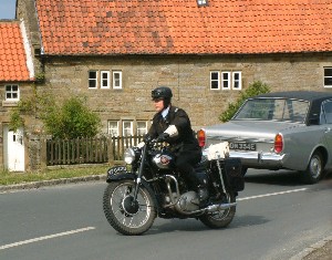 PC Walker (Jonathan Kerrigan) on his motorbike, Aidensfield